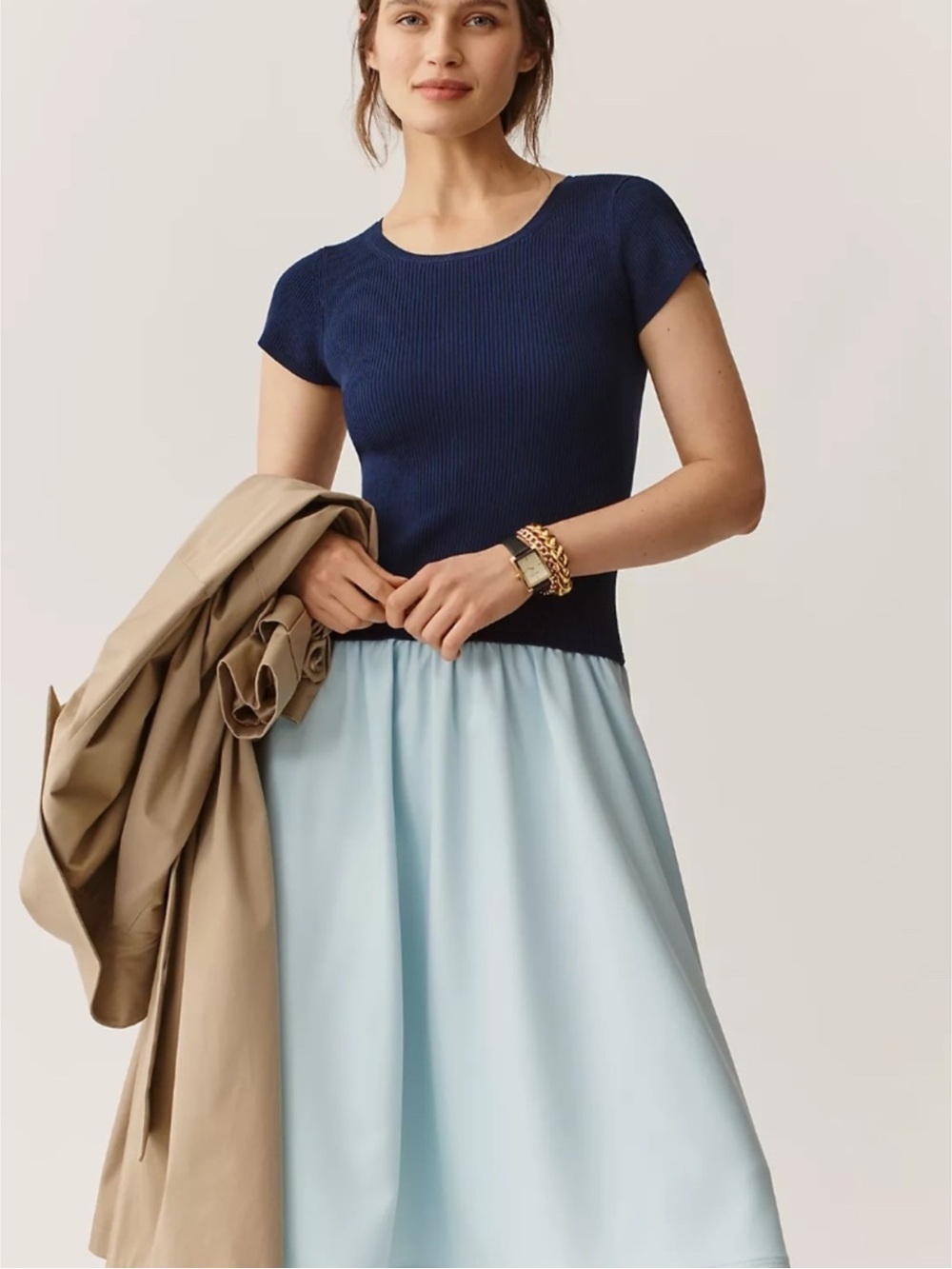 Anthropologie dress. Navy sweater top with short sleeves, baby blue midi skirt.